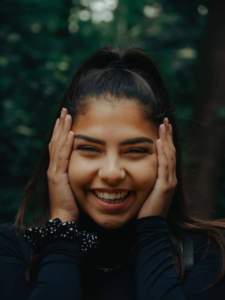 Worst Writing Conference Horror Stories post featured image of girl holding her face in shock