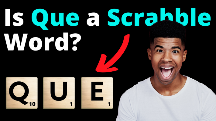 Man with surprised look and Que Scrabble tiles—Is Que a Scrabble Word